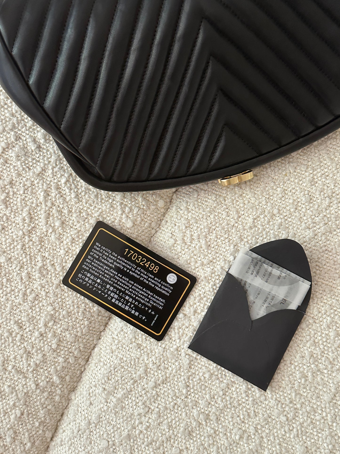 CHANEL LAMBSKIN CHEVRON QUILTED CLUTCH